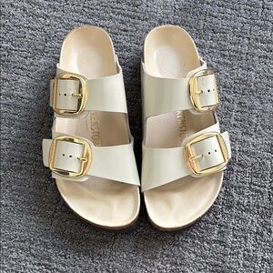 Like New Birkenstock Cream Sandals with Gold Buckles